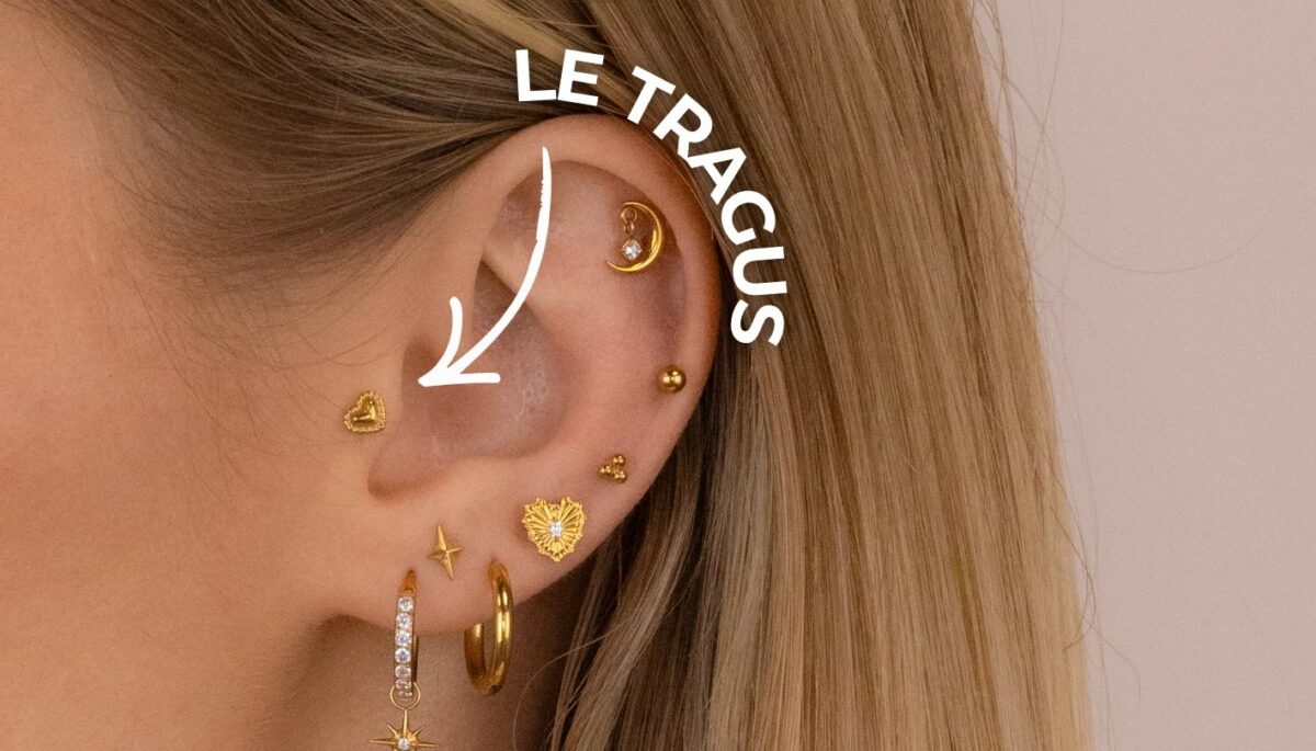 Piercing tragus discret avec bijou à pierre sur le cartilage de l'oreille